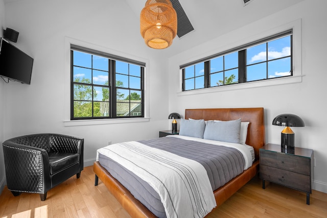 350 Bradford St Unit U5, Provincetown, MA 02657 - bedroom with wood finished floors and baseboards