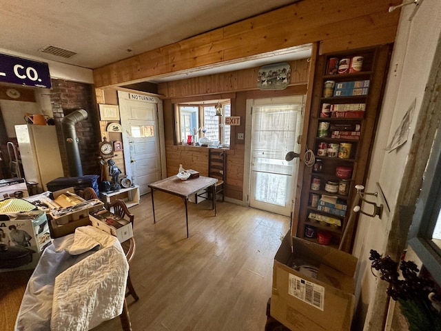 interior space featuring visible vents and wood finished floors