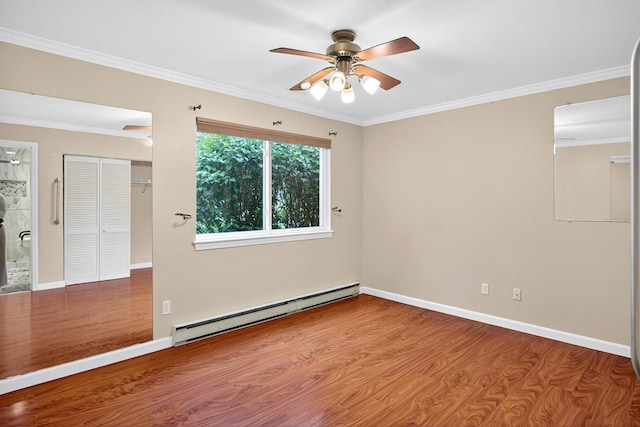 87 Susanna Dr, Brewster, MA 02631 - empty room featuring baseboard heating, wood finished floors, ceiling fan, and ornamental molding