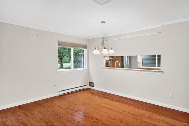 87 Susanna Dr, Brewster, MA 02631 - empty room featuring a baseboard radiator, a chandelier, wood finished floors, and ornamental molding