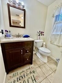 4 Westcliff Dr Unit 4, Cedarville, MA 02360 - bathroom featuring baseboards, vanity, tile patterned flooring, and toilet