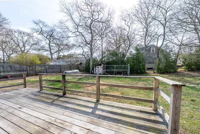 1 Stevens Way, Harwich, MA 02645 - wooden deck featuring an outbuilding, a storage shed, and a fenced backyard