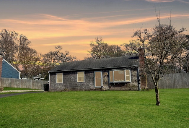1 Stevens Way, Harwich, MA 02645 - view of front of property with a front lawn, a chimney, and fence