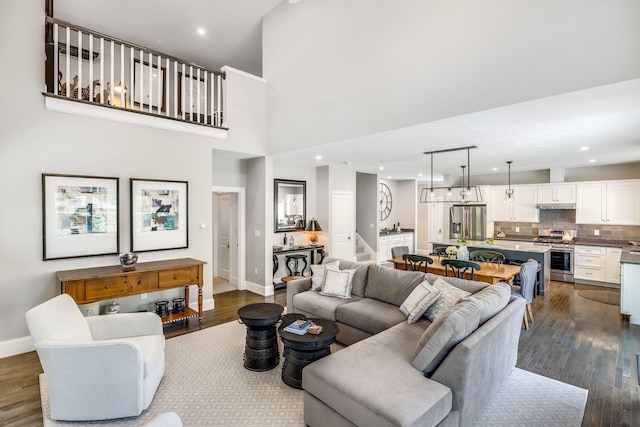 41 Old Main Rd Unit 3Au, North Falmouth, MA 02556 - living room with baseboards, dark wood-style floors, recessed lighting, and a high ceiling