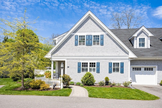 41 Old Main Rd Unit 3Au, North Falmouth, MA 02556 - view of front of house featuring asphalt driveway, an attached garage, and a shingled roof