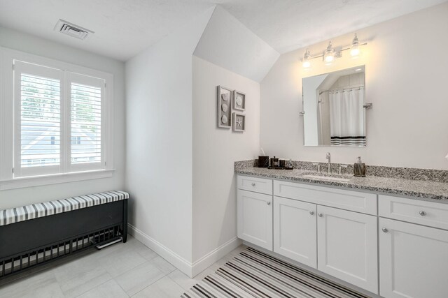 41 Old Main Rd Unit 3Au, North Falmouth, MA 02556 - full bath with vanity, baseboards, and a shower with shower curtain