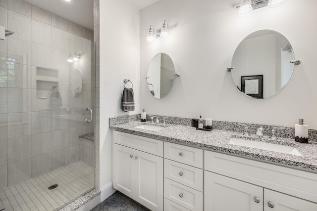 41 Old Main Rd Unit 3Au, North Falmouth, MA 02556 - bathroom featuring a stall shower and double vanity