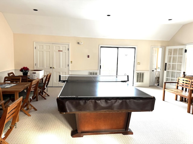 playroom with light carpet and lofted ceiling