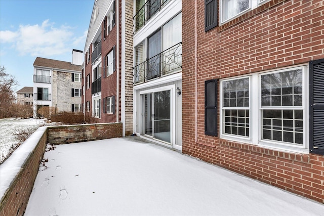 view of snow covered patio