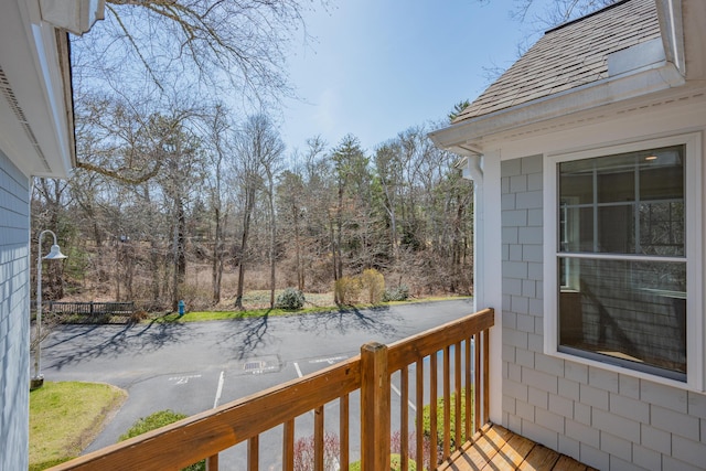 wooden terrace featuring covered porch