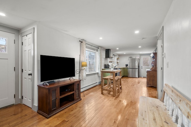 18 Race Rd, West Yarmouth, MA 02673 - living area with a baseboard heating unit, plenty of natural light, light wood-type flooring, and recessed lighting