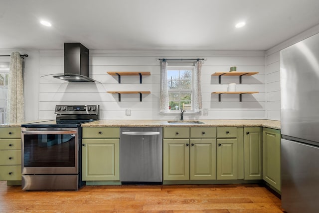 18 Race Rd, West Yarmouth, MA 02673 - kitchen featuring stainless steel appliances, green cabinetry, wall chimney range hood, open shelves, and recessed lighting