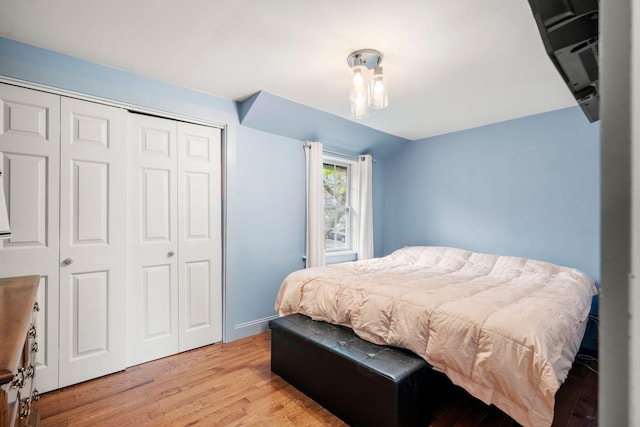 18 Race Rd, West Yarmouth, MA 02673 - bedroom featuring light wood-style floors, a closet, baseboards, and lofted ceiling