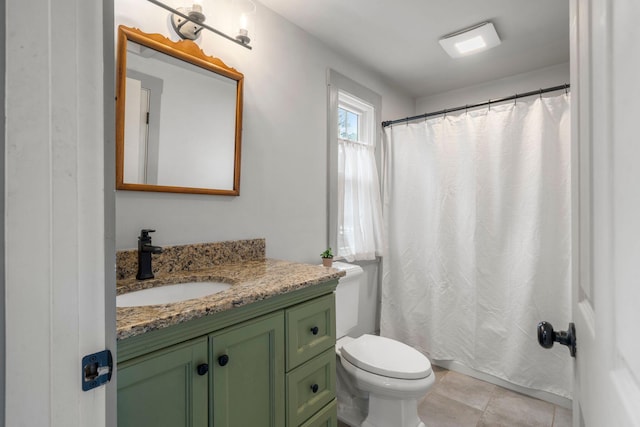 18 Race Rd, West Yarmouth, MA 02673 - bathroom featuring toilet, vanity, a shower with shower curtain, and tile patterned flooring