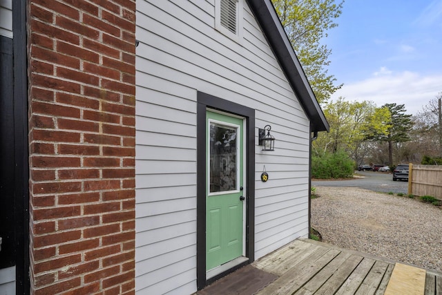 18 Race Rd, West Yarmouth, MA 02673 - view of exterior entry featuring brick siding
