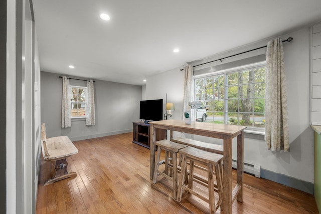 18 Race Rd, West Yarmouth, MA 02673 - dining space with light wood-type flooring, a baseboard radiator, baseboards, healthy amount of natural light, and recessed lighting