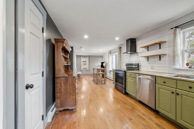18 Race Rd, West Yarmouth, MA 02673 - kitchen featuring green cabinets, appliances with stainless steel finishes, wall chimney exhaust hood, open shelves, and a sink