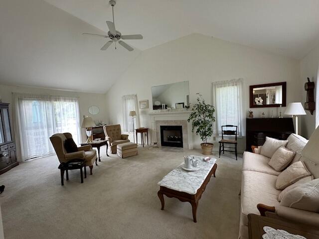 481 Buck Island Rd Unit 17Fa, West Yarmouth, MA 02673 - living area featuring a ceiling fan, carpet floors, a fireplace, and high vaulted ceiling