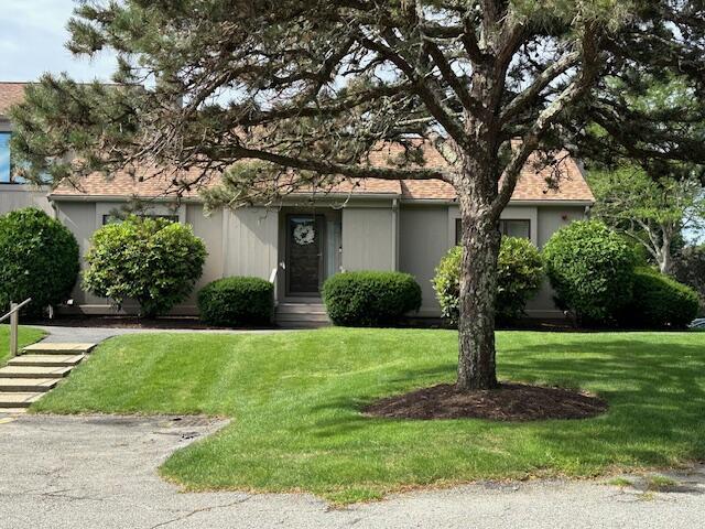 481 Buck Island Rd Unit 17Fa, West Yarmouth, MA 02673 - obstructed view of property with a front lawn