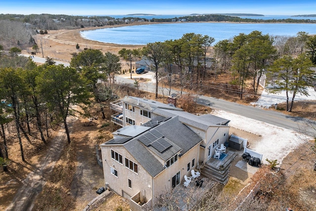 bird's eye view with a water view