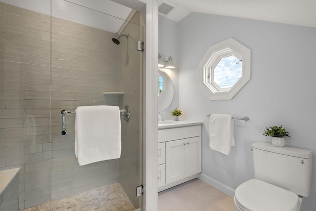 bathroom with vanity, a shower with shower door, vaulted ceiling with skylight, and toilet