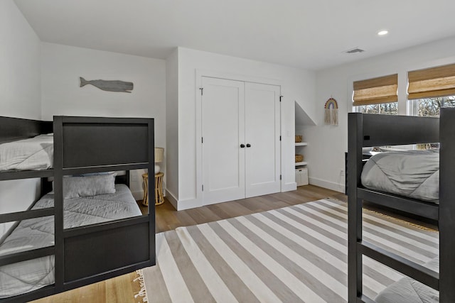 bedroom featuring hardwood / wood-style floors