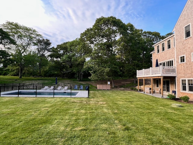 view of yard featuring a patio and a swimming pool side deck