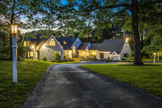 38 Beach Plum Hill Rd, Osterville, MA 02655 - view of front facade with driveway and a front lawn