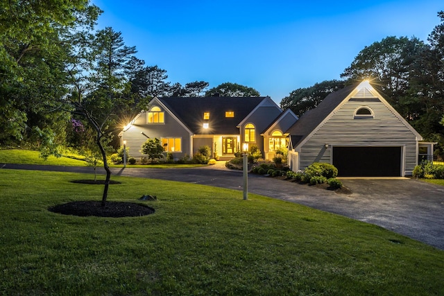 38 Beach Plum Hill Rd, Osterville, MA 02655 - view of front of property with asphalt driveway, a garage, and a front yard