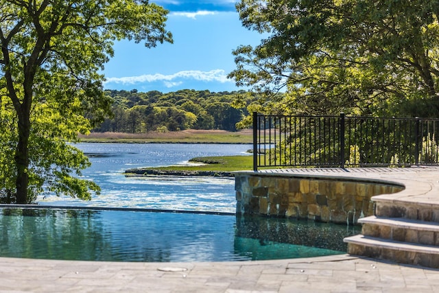 38 Beach Plum Hill Rd, Osterville, MA 02655 - view of swimming pool featuring a water view and a wooded view