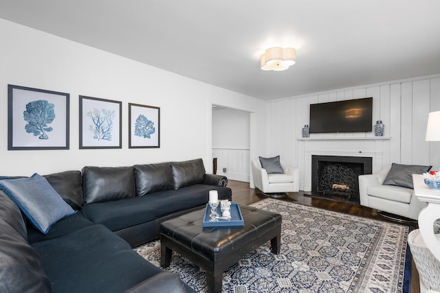 193 Main St, Sandwich, MA 02563 - living room with wood finished floors and a fireplace