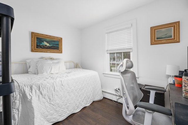 193 Main St, Sandwich, MA 02563 - bedroom with a baseboard radiator and wood finished floors