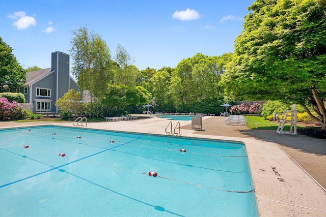 12 Wildflower Vlg, Yarmouth Port, MA 02675 - community pool with a patio area