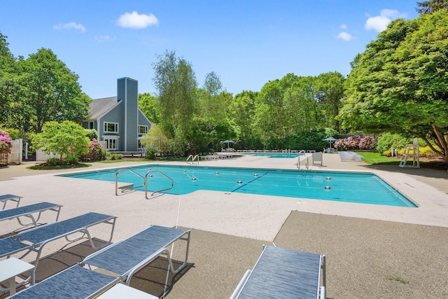12 Wildflower Vlg, Yarmouth Port, MA 02675 - community pool featuring a patio