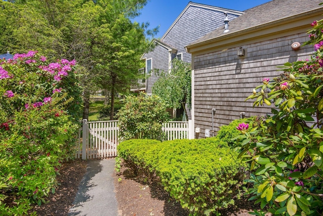 12 Wildflower Vlg, Yarmouth Port, MA 02675 - view of yard with a gate
