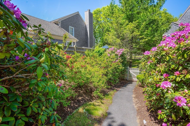 12 Wildflower Vlg, Yarmouth Port, MA 02675 - view of yard featuring a gate