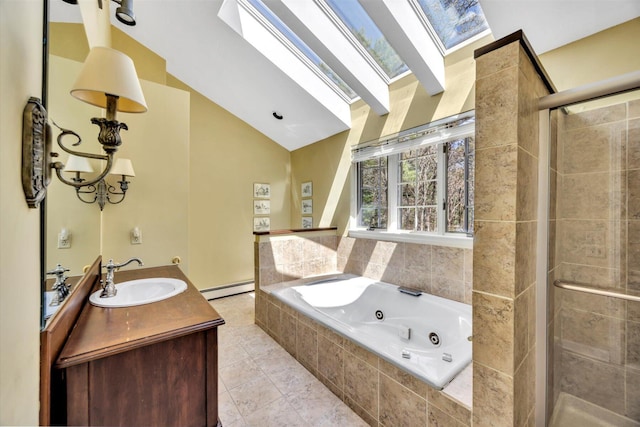bathroom with vanity, a tub with jets, a baseboard heating unit, vaulted ceiling with skylight, and a shower stall