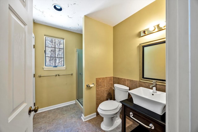 full bath with tile patterned flooring, a shower stall, vanity, baseboards, and toilet