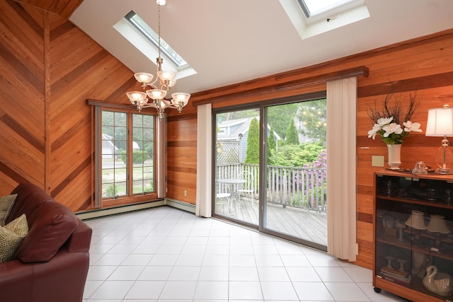 51 Manitoba Rd, Mashpee, MA 02649 - doorway featuring a skylight, wooden walls, baseboard heating, a chandelier, and vaulted ceiling