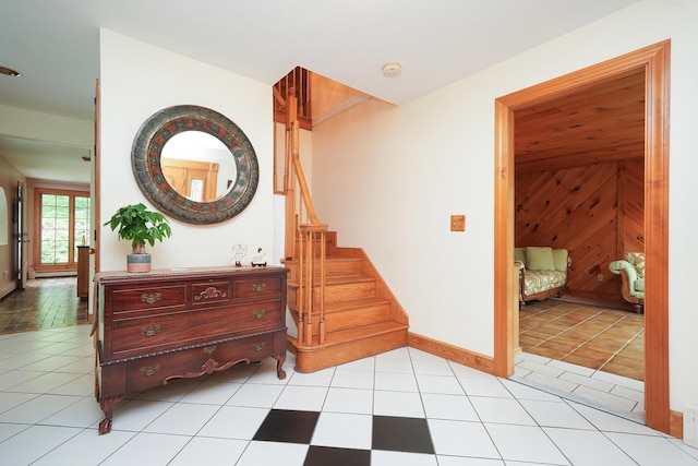 51 Manitoba Rd, Mashpee, MA 02649 - staircase with baseboards and tile patterned floors