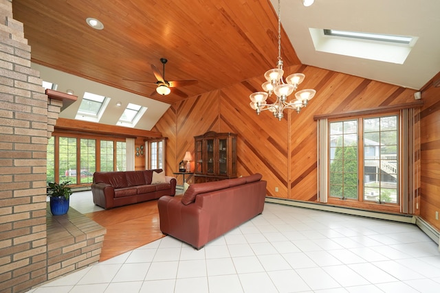 51 Manitoba Rd, Mashpee, MA 02649 - living room with a skylight, lofted ceiling, plenty of natural light, a chandelier, and ceiling fan