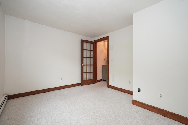 51 Manitoba Rd, Mashpee, MA 02649 - spare room featuring light carpet and baseboard heating