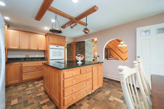 51 Manitoba Rd, Mashpee, MA 02649 - kitchen featuring oven, recessed lighting, black electric stovetop, a kitchen island, and a baseboard heating unit