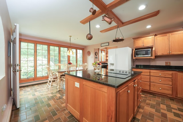 51 Manitoba Rd, Mashpee, MA 02649 - kitchen featuring stainless steel microwave, white fridge with ice dispenser, a baseboard radiator, black electric cooktop, and a kitchen island