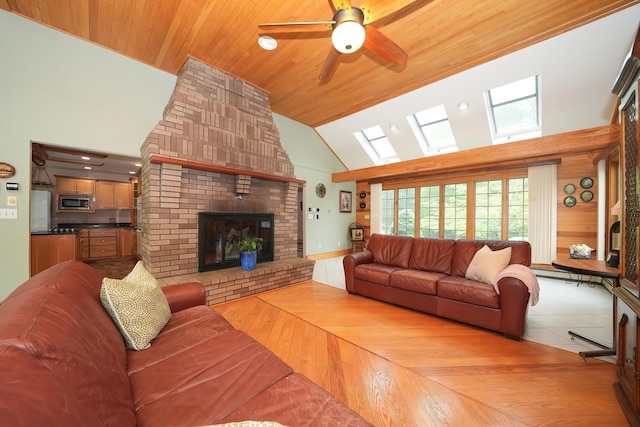 51 Manitoba Rd, Mashpee, MA 02649 - living area with high vaulted ceiling, a skylight, wooden ceiling, light wood-style flooring, and a brick fireplace