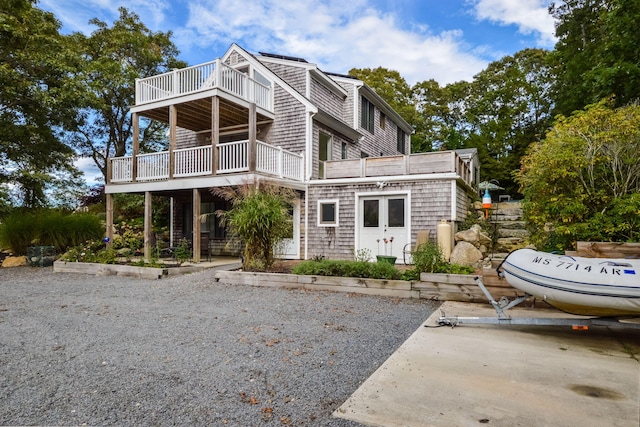 10 Westerly Dr, Bourne, MA 02532 - rear view of house with a balcony