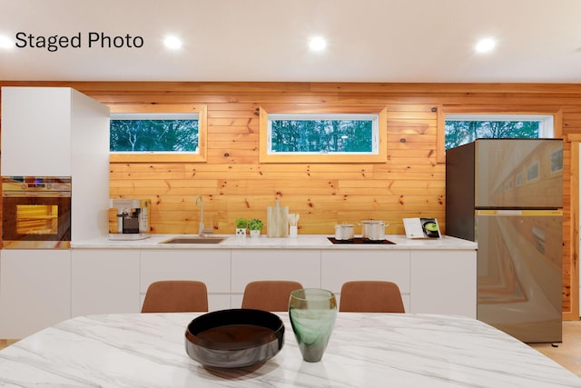 10 Westerly Dr, Bourne, MA 02532 - dining area featuring recessed lighting and wooden walls