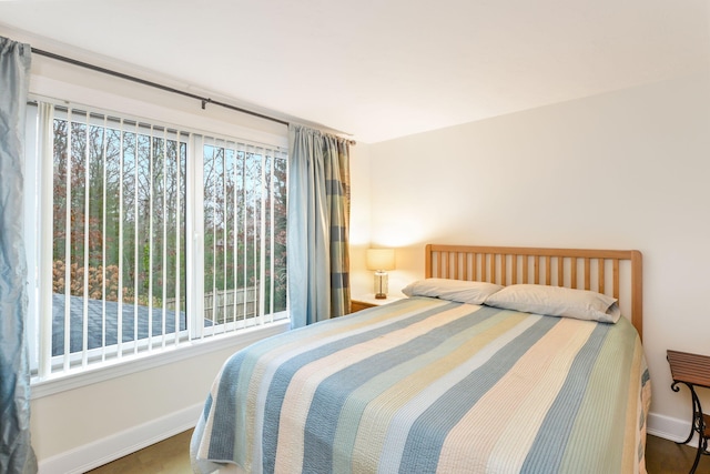 10 Westerly Dr, Bourne, MA 02532 - bedroom with baseboards and multiple windows