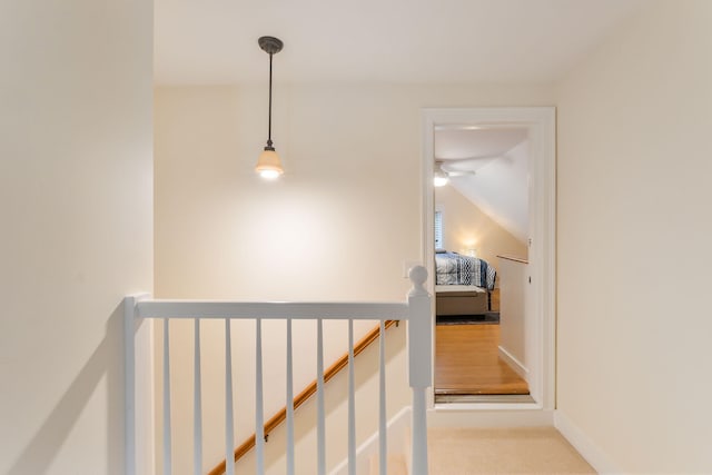 10 Westerly Dr, Bourne, MA 02532 - corridor with vaulted ceiling, carpet, and an upstairs landing