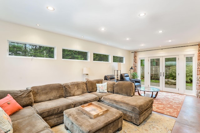 10 Westerly Dr, Bourne, MA 02532 - living room with recessed lighting, concrete floors, and french doors